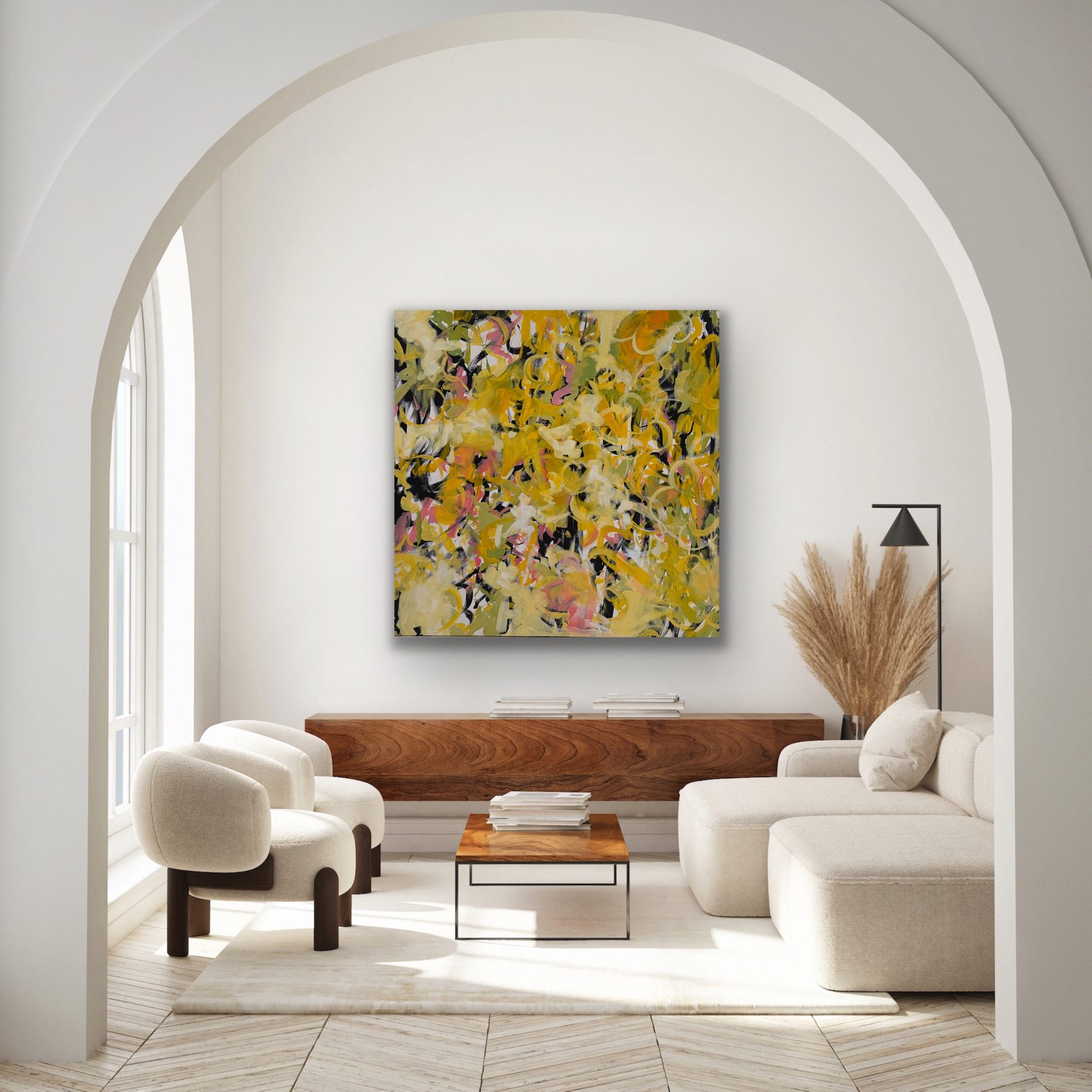 Minimalist living room with neutral tones and abstract art.